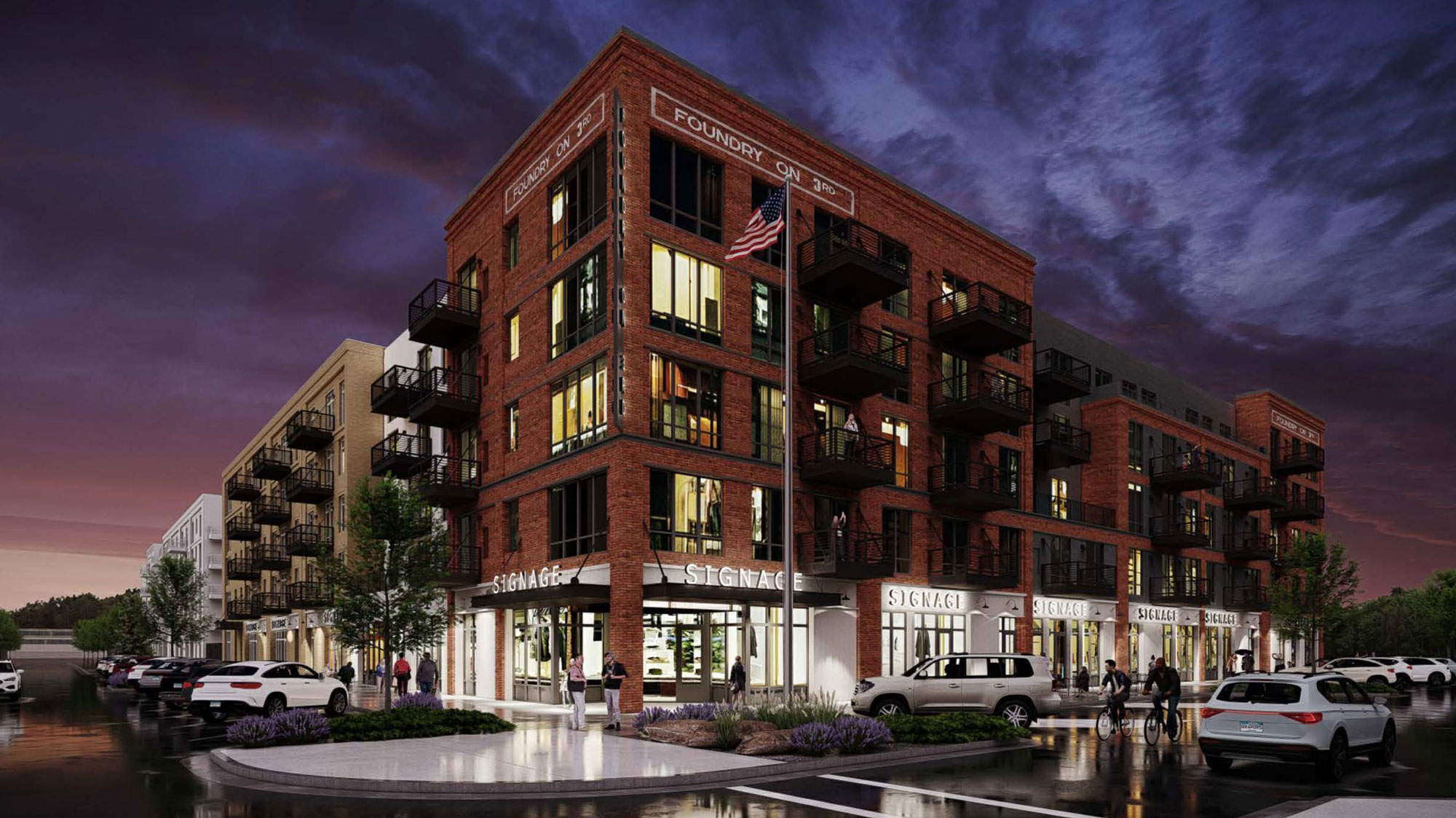 Exterior facade at night | The Foundry on 3rd in Wausau, WI | multifamily architecture by JLA Architects